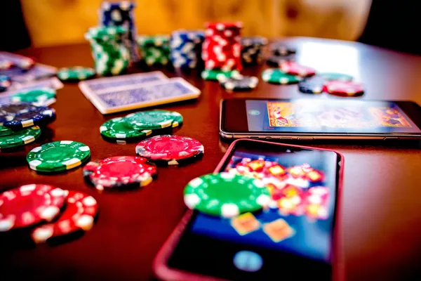 A glowing roulette wheel with cascading chips, symbolizing the engaging live and instant-win games available on BDTJL.